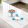 Stainless steel container with blue lids on a kitchen counter, filled with colorful candies.