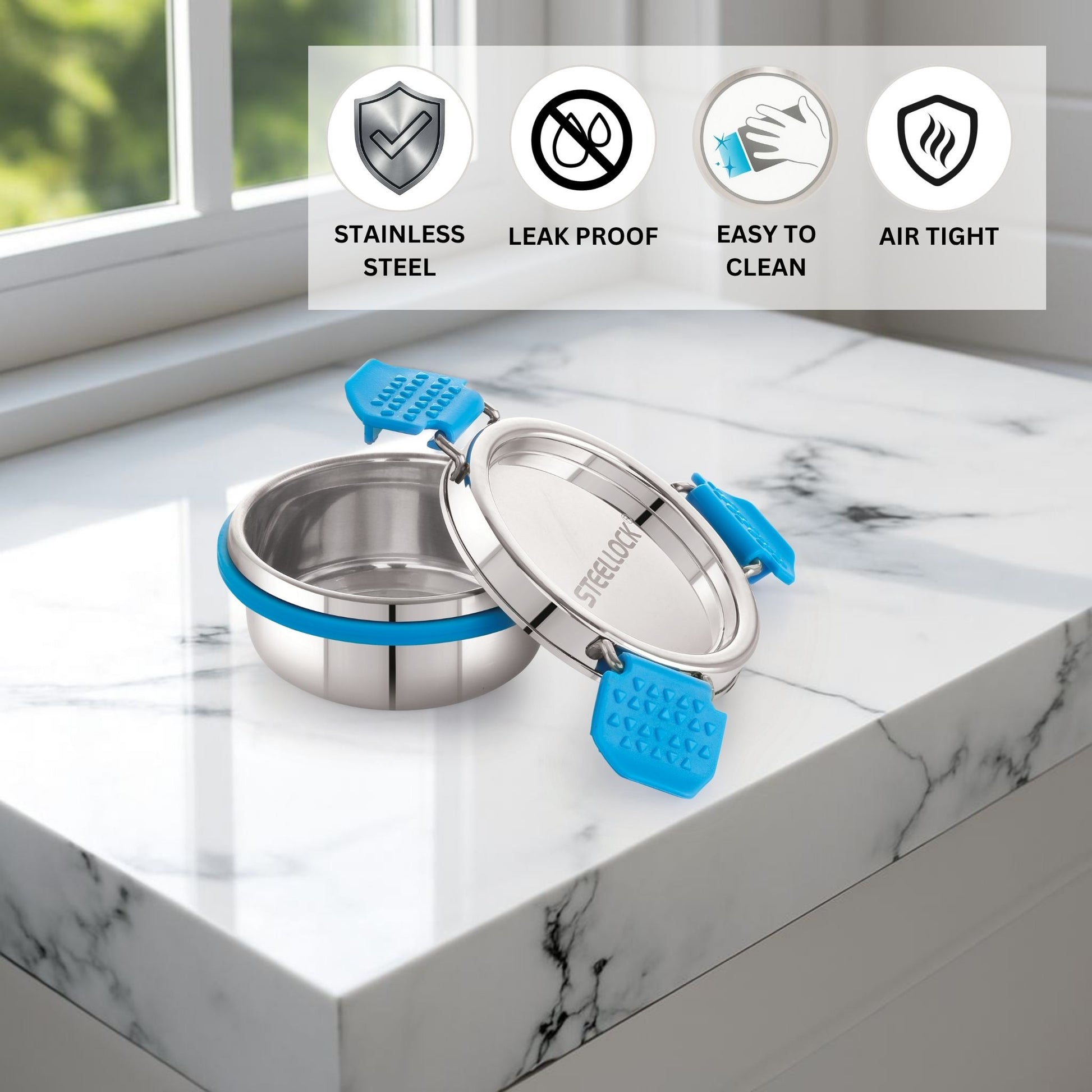 Stainless steel containers with blue silicone bands on a marble surface, featuring icons for stainless steel, leak proof, easy to clean, and air tight.
