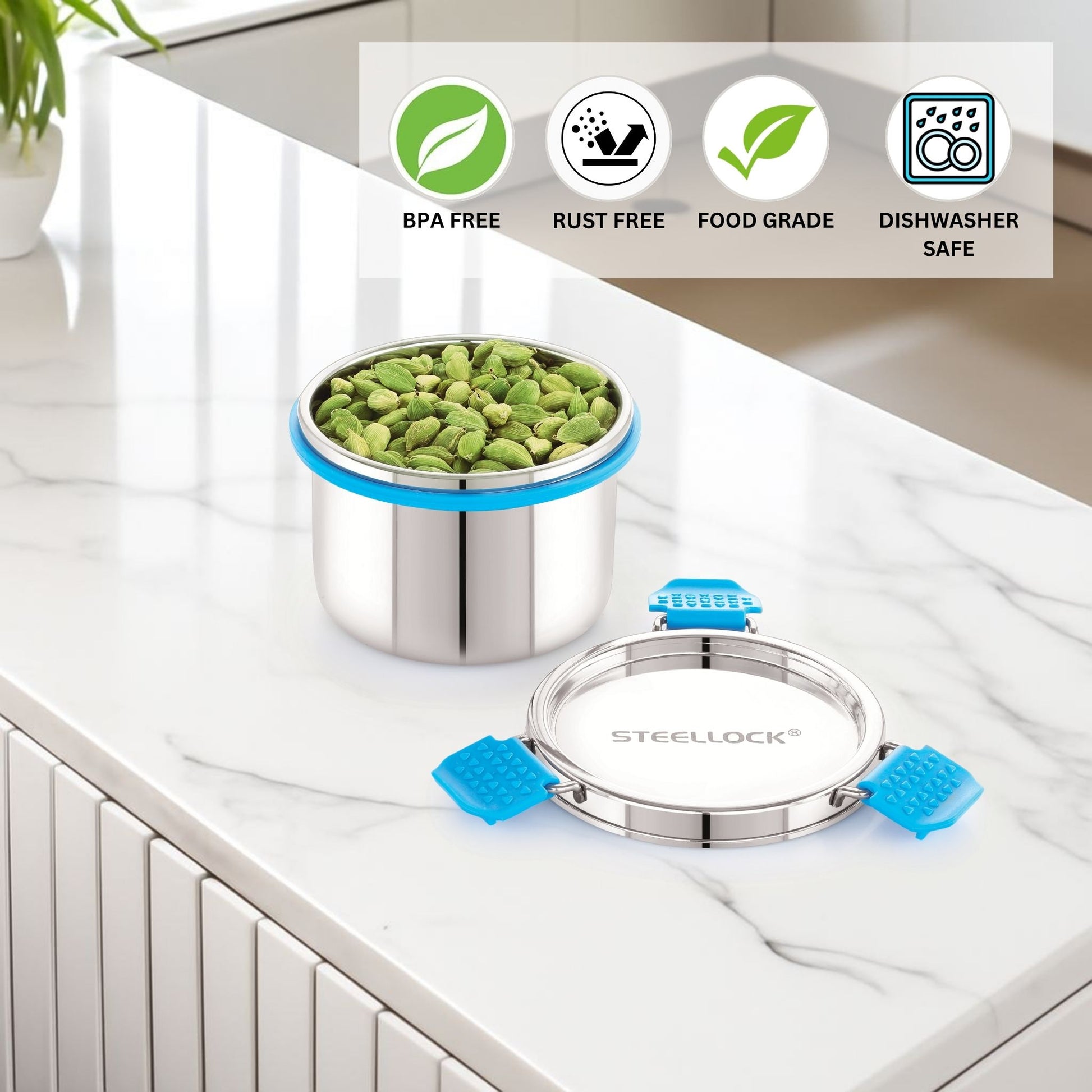 Stainless steel container with blue sealing rings on a kitchen counter, featuring 'Steelock' brand.