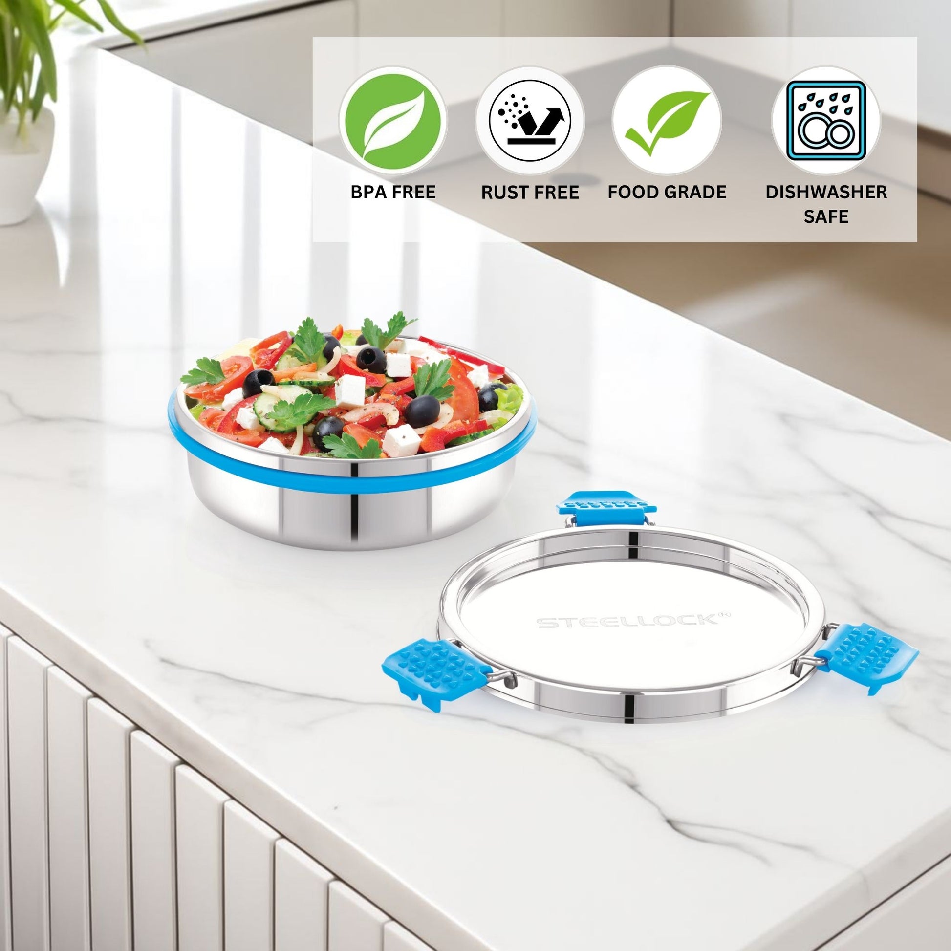 Stainless steel food container with salad on a kitchen counter, featuring safety certification icons.