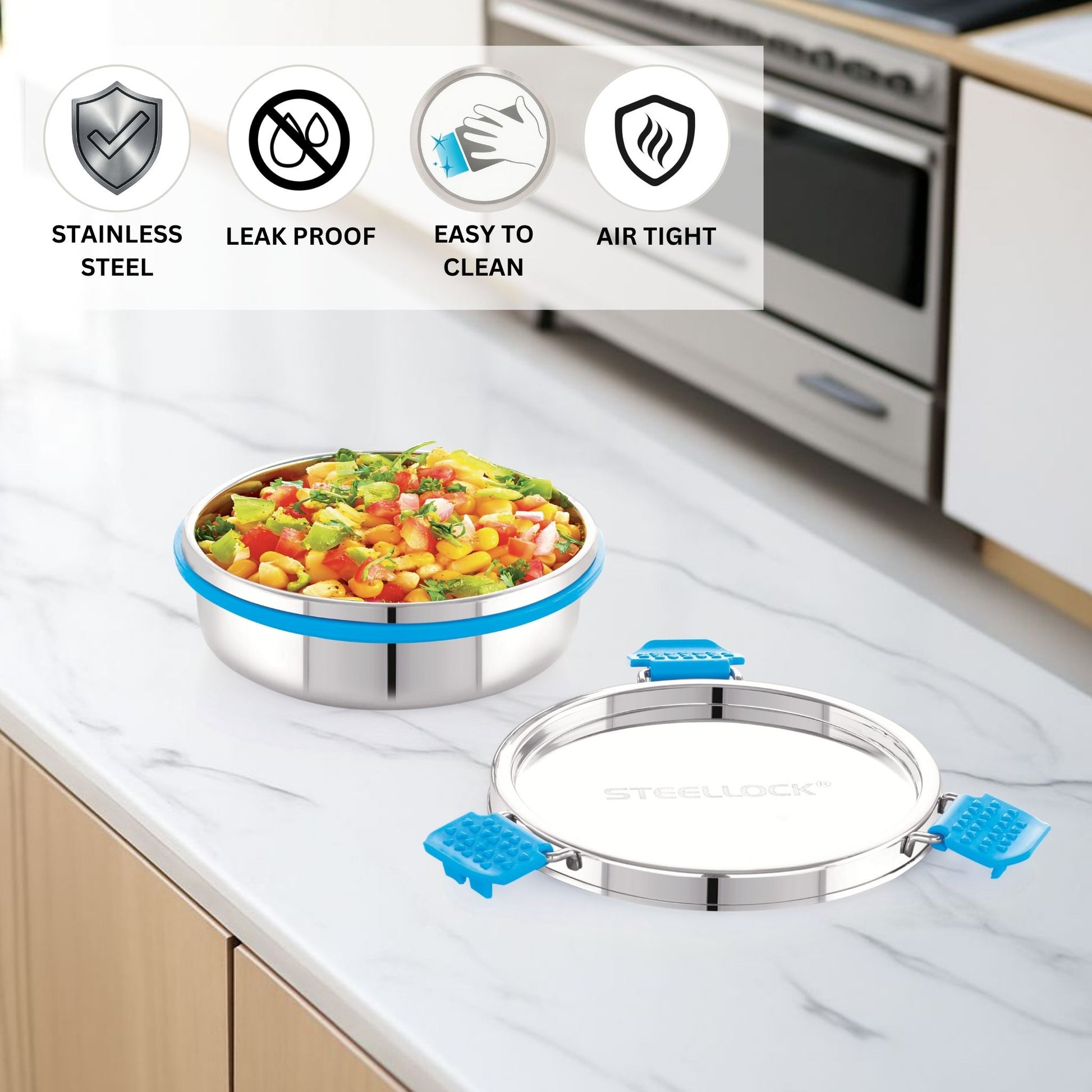 Stainless steel food container with lid on a kitchen counter, featuring icons for stainless steel, leak proof, easy to clean, and air tight.
