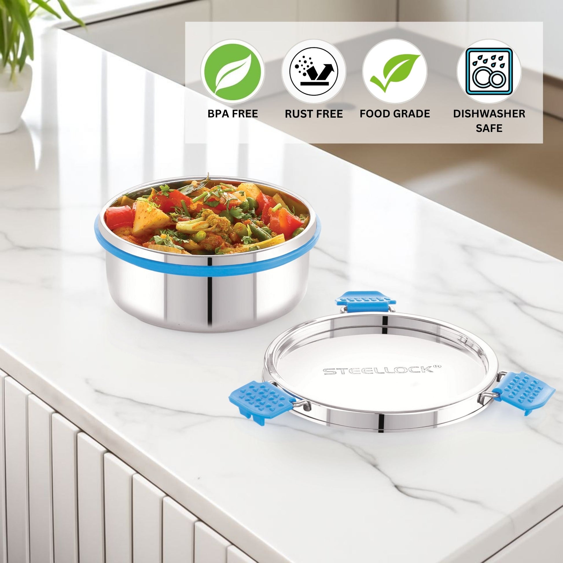 Stainless steel food container with blue stainless steel lid on a kitchen counter, featuring BPA-Free, Rust-Free, Food-grade and dishwasher safe