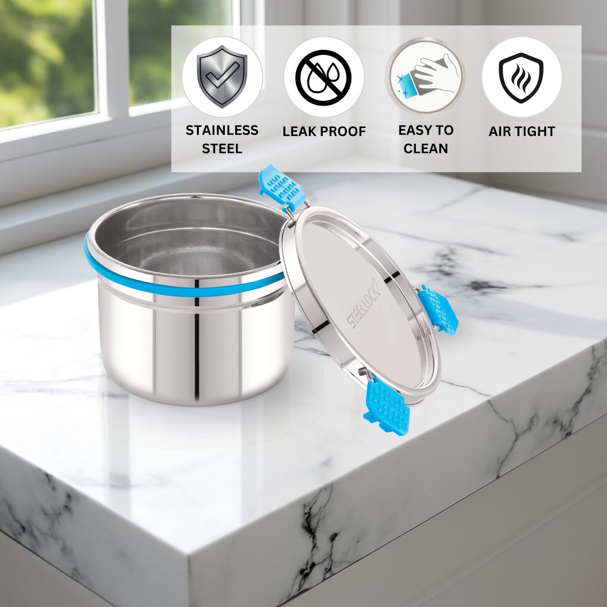 Stainless steel container with lid on a marble surface, featuring icons and text about material properties.