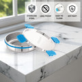 Stainless steel container with blue lids on a marble surface, featuring icons and text about material properties.