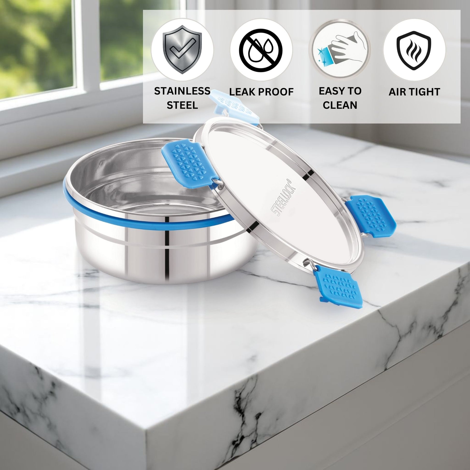 Stainless steel container with blue straps on a marble surface, featuring icons and text about material properties.