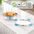 Stainless steel food container with blue accents on a kitchen counter, featuring BPA-free, rust-free, food-grade, and dishwasher-safe icons.