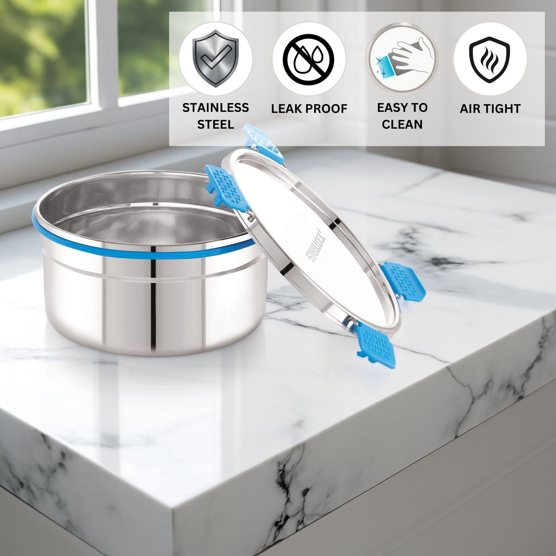 Stainless steel container with blue accents on a marble surface, featuring icons and text about material properties.