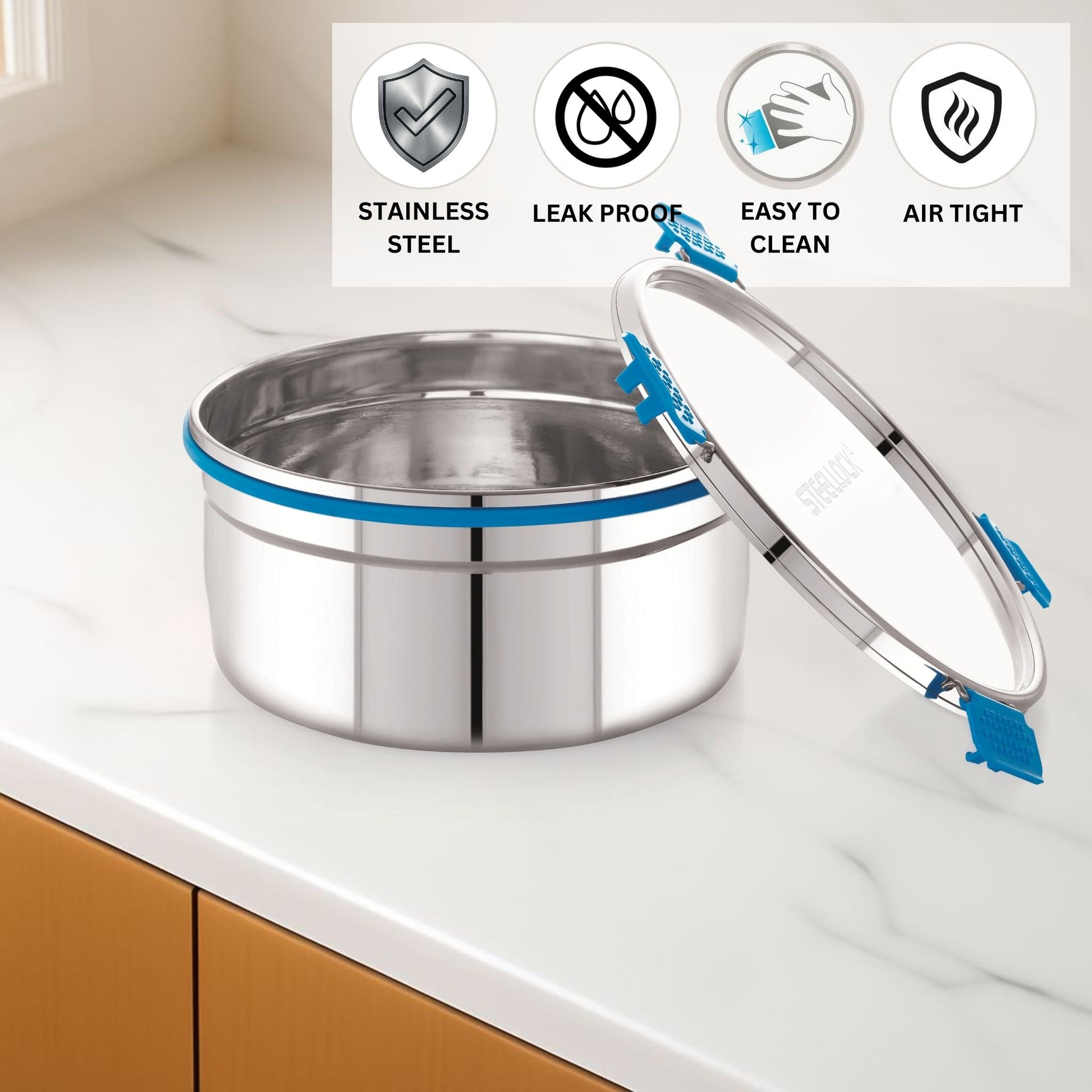 Stainless steel container with a lid on a kitchen counter, featuring icons for stainless steel, leak proof, easy to clean, and air tight.
